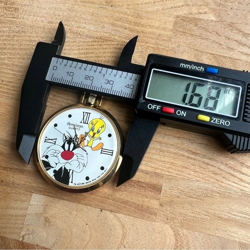 Vintage Armitron Looney Tunes Sylvester and tweety pocket watch NEW BATTERY